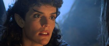 Movie still from “Star Trek III: The Search for Spock” (1984), directed by Leonard Nimoy – A woman's face in a dark room; Close Up shot, Low angle