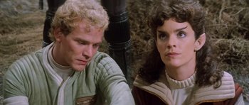 Movie still from “Star Trek III: The Search for Spock” (1984), directed by Leonard Nimoy – A man and a woman sitting next to each other; Close Up shot, Over the shoulder angle