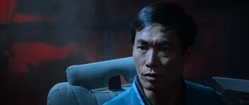 Movie still from “Star Trek III: The Search for Spock” (1984), directed by Leonard Nimoy – A person sitting in a car seat; Close Up shot, Low angle