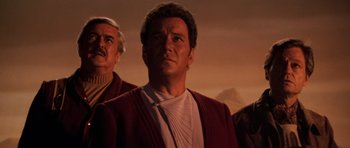 Movie still from “Star Trek III: The Search for Spock” (1984), directed by Leonard Nimoy – A group of men standing next to each other; Medium shot, Low angle