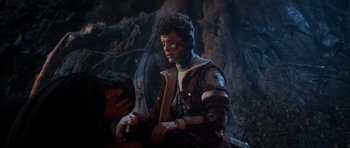 Movie still from “Star Trek III: The Search for Spock” (1984), directed by Leonard Nimoy – A man in a brown jacket is looking at something; Medium shot, Over the shoulder angle