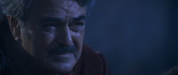 Movie still from “Star Trek III: The Search for Spock” (1984), directed by Leonard Nimoy – An older man with a mustache and a mustache comb; Close Up shot, Low angle