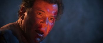 Movie still from “Star Trek III: The Search for Spock” (1984), directed by Leonard Nimoy – A person with blood all over his face; Close Up shot, Low angle