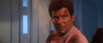 Movie still from “Star Trek III: The Search for Spock” (1984), directed by Leonard Nimoy – A person wearing makeup; Close Up shot, Over the shoulder angle