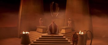 Movie still from “Star Trek III: The Search for Spock” (1984), directed by Leonard Nimoy – A man sitting on top of a chair in a room; Extreme Wide shot, High angle