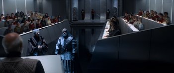 Movie still from “Star Trek IV: The Voyage Home” (1986), directed by Leonard Nimoy – A man and a woman are standing next to each other in a room; Wide shot, Over the shoulder angle