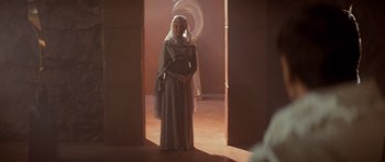 Movie still from “Star Trek IV: The Voyage Home” (1986), directed by Leonard Nimoy – A woman dressed as a nun standing in a room; Medium shot, Over the shoulder angle