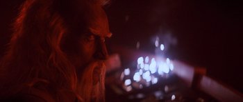 Movie still from “Star Trek IV: The Voyage Home” (1986), directed by Leonard Nimoy – An old man with long hair and a white beard looking into the distance; Close Up shot, Over the shoulder angle