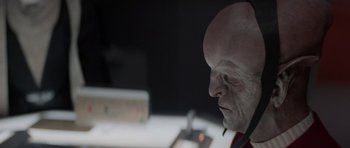 Movie still from “Star Trek IV: The Voyage Home” (1986), directed by Leonard Nimoy – A bald man with a cigarette in his mouth; Close Up shot, High angle