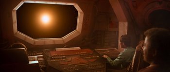 Movie still from “Star Trek IV: The Voyage Home” (1986), directed by Leonard Nimoy – A man sitting at a desk in front of a window; Extreme Wide shot, High angle