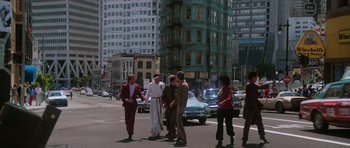 Movie still from “Star Trek IV: The Voyage Home” (1986), directed by Leonard Nimoy – A group of people standing on a street corner; Extreme Wide shot, Low angle