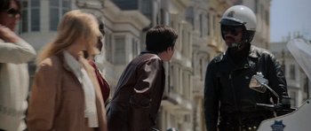 Movie still from “Star Trek IV: The Voyage Home” (1986), directed by Leonard Nimoy – A group of people standing next to each other on a street; Medium shot, Over the shoulder angle