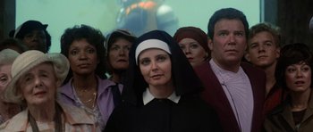 Movie still from “Star Trek IV: The Voyage Home” (1986), directed by Leonard Nimoy – A group of people standing next to each other in a room; Close Up shot, Low angle
