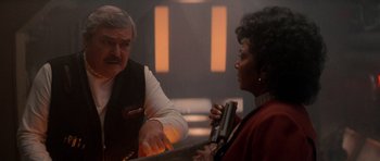 Movie still from “Star Trek IV: The Voyage Home” (1986), directed by Leonard Nimoy – A man and a woman are talking to each other; Medium shot, Over the shoulder angle