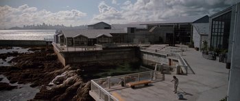 Movie still from “Star Trek IV: The Voyage Home” (1986), directed by Leonard Nimoy – An outdoor area with a bench and a pond; Extreme Wide shot, High angle