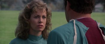 Movie still from “Star Trek IV: The Voyage Home” (1986), directed by Leonard Nimoy – A woman is talking to a man in a field; Close Up shot, Over the shoulder angle