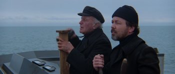 Movie still from “Star Trek IV: The Voyage Home” (1986), directed by Leonard Nimoy – Two older men standing on a boat in the water; Medium shot, Low angle