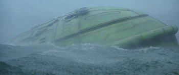 Movie still from “Star Trek IV: The Voyage Home” (1986), directed by Leonard Nimoy – A green boat floating on top of a body of water; Extreme Wide shot, Low angle