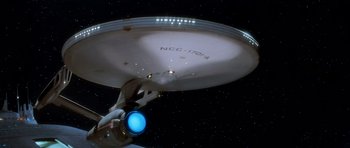 Movie still from “Star Trek IV: The Voyage Home” (1986), directed by Leonard Nimoy – A star trek ship is shown in the sky; Extreme Wide shot, Low angle