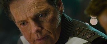 Movie still from “Star Trek Into Darkness” (2013), directed by J.J. Abrams – An older man with a gray beard looking at the camera; Close Up shot, Low angle