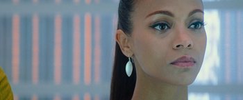 Movie still from “Star Trek Into Darkness” (2013), directed by J.J. Abrams – A person wearing a pair of earrings; Close Up shot, Over the shoulder angle