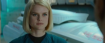 Movie still from “Star Trek Into Darkness” (2013), directed by J.J. Abrams – A person with blonde hair; Close Up shot, Over the shoulder angle