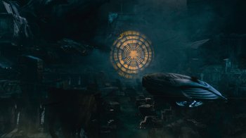 Movie still from “Star Trek Into Darkness” (2013), directed by J.J. Abrams – A dark room with a light in the center of it; Extreme Wide shot, Overhead angle