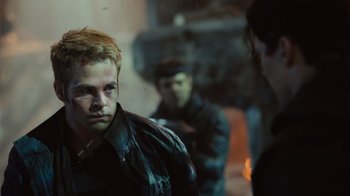 Movie still from “Star Trek Into Darkness” (2013), directed by J.J. Abrams – A young man in a leather jacket looking at the camera; Close Up shot, Over the shoulder angle