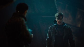 Movie still from “Star Trek Into Darkness” (2013), directed by J.J. Abrams – A man in a jacket standing next to another man in a jacket; Medium shot, Over the shoulder angle