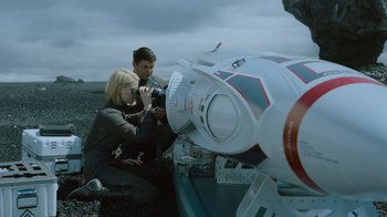 Movie still from “Star Trek Into Darkness” (2013), directed by J.J. Abrams – A man and a woman looking through a telescope; Medium shot, High angle