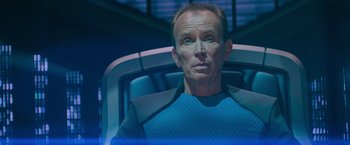 Movie still from “Star Trek Into Darkness” (2013), directed by J.J. Abrams – A man sitting in a chair looking up at the sky; Close Up shot, Over the shoulder angle