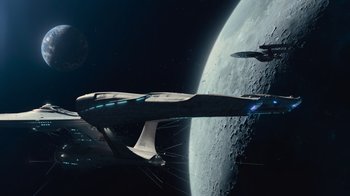Movie still from “Star Trek Into Darkness” (2013), directed by J.J. Abrams – A space ship in front of the moon and the earth; Extreme Wide shot, Overhead angle