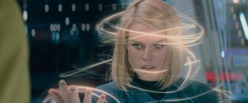 Movie still from “Star Trek Into Darkness” (2013), directed by J.J. Abrams – A blonde woman is looking at the camera; Close Up shot, Low angle