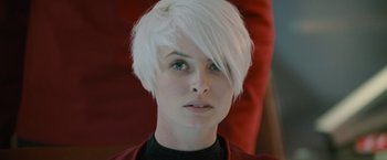 Movie still from “Star Trek Into Darkness” (2013), directed by J.J. Abrams – A person wearing a white wig; Close Up shot, Over the shoulder angle