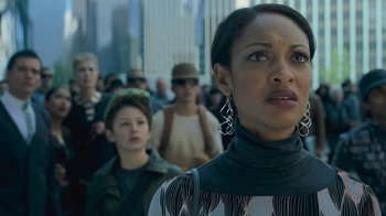 Movie still from “Star Trek Into Darkness” (2013), directed by J.J. Abrams – A crowd of people walking down a street; Close Up shot, Over the shoulder angle