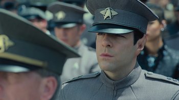 Movie still from “Star Trek Into Darkness” (2013), directed by J.J. Abrams – A group of men in uniform are standing in a row; Close Up shot, Over the shoulder angle
