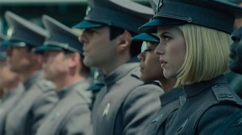 Movie still from “Star Trek Into Darkness” (2013), directed by J.J. Abrams – A group of people in uniforms are standing in a line; Close Up shot, Low angle