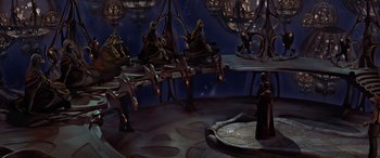 Movie still from “Star Wars: Episode I - The Phantom Menace” (1999), directed by George Lucas – A group of people sitting on chairs in a room; Extreme Wide shot, High angle