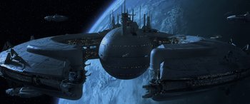 Movie still from “Star Wars: Episode I - The Phantom Menace” (1999), directed by George Lucas – An image of a space ship in the sky; Extreme Wide shot, Low angle