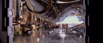 Movie still from “Star Wars: Episode I - The Phantom Menace” (1999), directed by George Lucas – People are standing in an airplane hangar; Extreme Wide shot, High angle