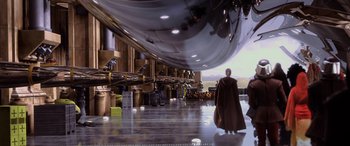 Movie still from “Star Wars: Episode I - The Phantom Menace” (1999), directed by George Lucas – A man in a brown robe walking down a ramp; Extreme Wide shot, Low angle
