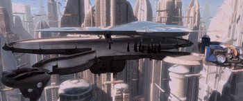 Movie still from “Star Wars: Episode I - The Phantom Menace” (1999), directed by George Lucas – A group of people standing on top of a building; Extreme Wide shot, High angle