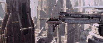 Movie still from “Star Wars: Episode I - The Phantom Menace” (1999), directed by George Lucas – An aerial view of a futuristic city with people sitting on top of it; Extreme Wide shot, High angle
