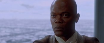 Movie still from “Star Wars: Episode I - The Phantom Menace” (1999), directed by George Lucas – A man's face in front of the ocean; Close Up shot, Over the shoulder angle