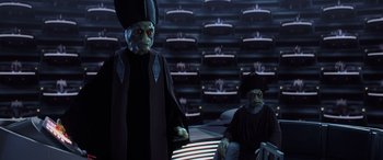 Movie still from “Star Wars: Episode I - The Phantom Menace” (1999), directed by George Lucas – Two people in a room with a lot of lights; Medium shot, High angle