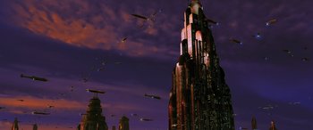 Movie still from “Star Wars: Episode I - The Phantom Menace” (1999), directed by George Lucas – An image of an alien city at night; Extreme Wide shot, Low angle