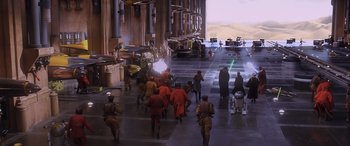 Movie still from “Star Wars: Episode I - The Phantom Menace” (1999), directed by George Lucas – A group of people walking down a street; Extreme Wide shot, High angle
