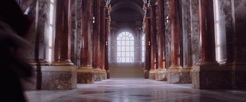 Movie still from “Star Wars: Episode I - The Phantom Menace” (1999), directed by George Lucas – A view of a building with a large window; Extreme Wide shot, Low angle