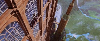 Movie still from “Star Wars: Episode I - The Phantom Menace” (1999), directed by George Lucas – An aerial view of a building with a waterfall in the background; Extreme Wide shot, Low angle