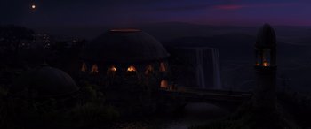 Movie still from “Star Wars: Episode I - The Phantom Menace” (1999), directed by George Lucas – A group of people sitting in a building near a waterfall; Extreme Wide shot, Low angle